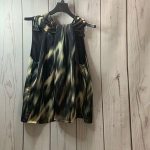 H&M polyester sleeveless blouse with polyester lining.